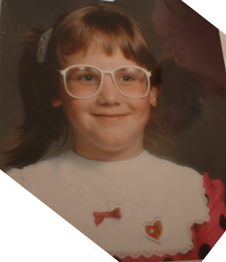 Illustration for article titled Goofy Glasses, Pretty Pigtails & Snaggletooth Smiles: September Is For School Portraits